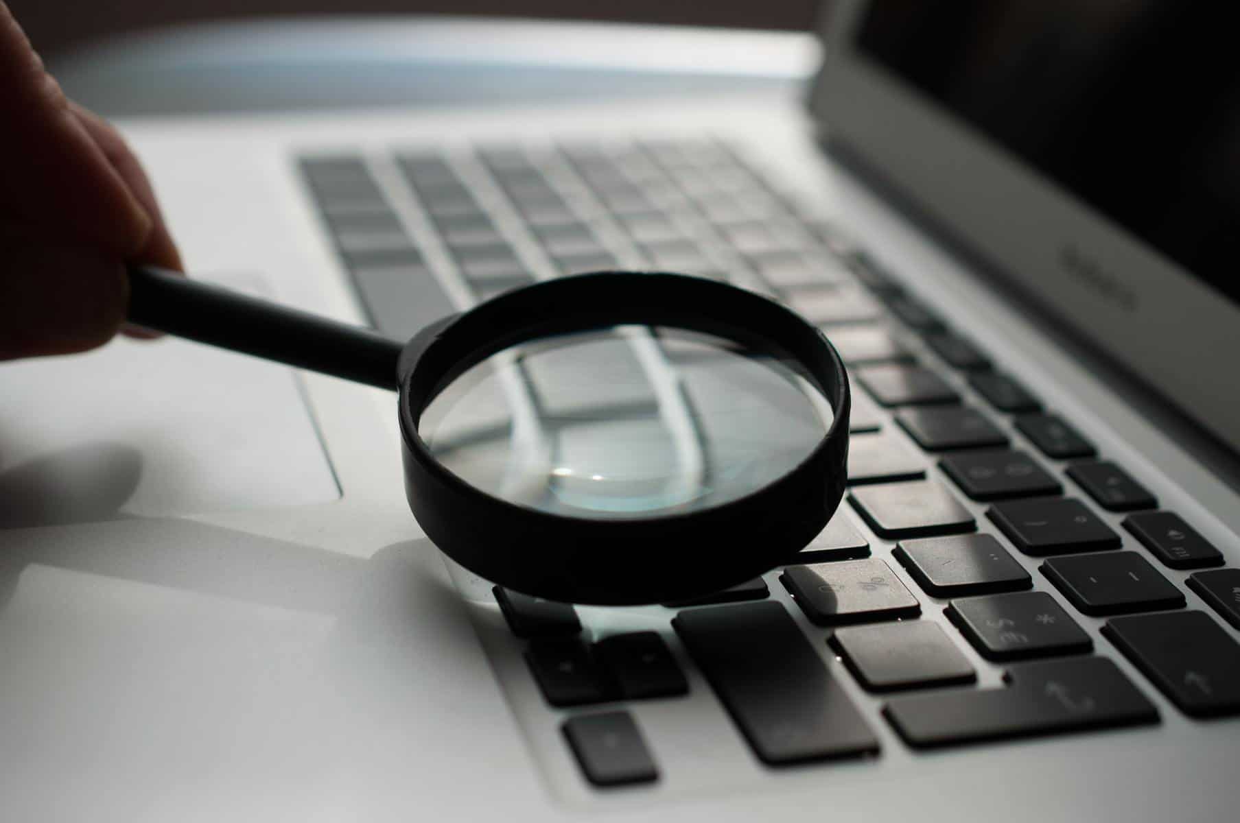 Magnifying glass on laptop