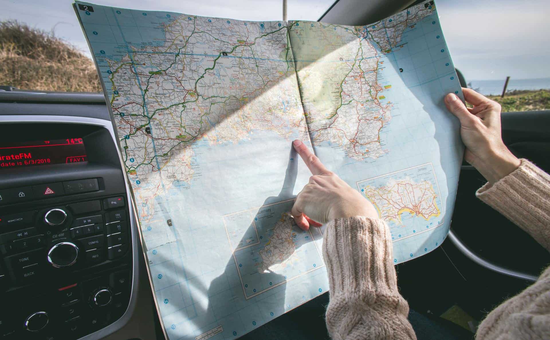 Woman pointing at map