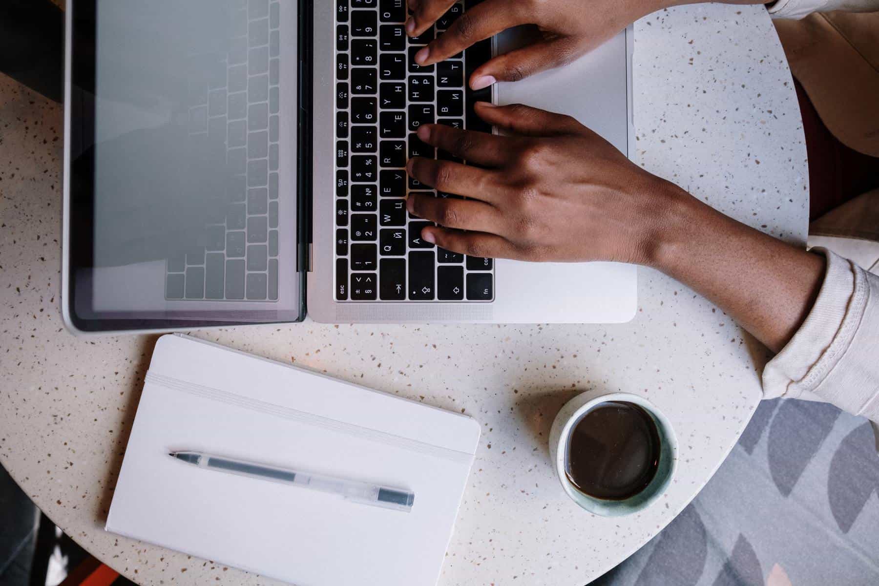 Woman typing on laptop