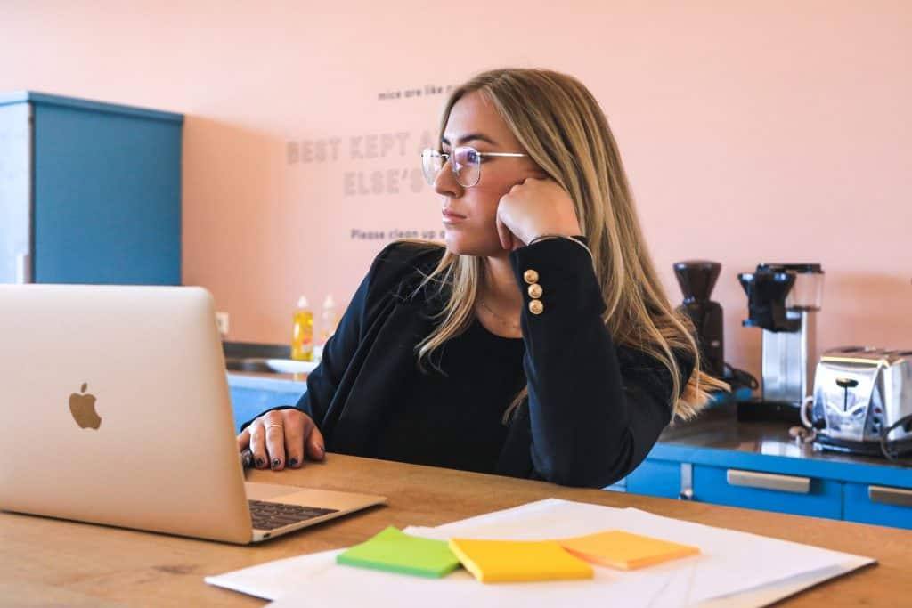 girl thinking while working