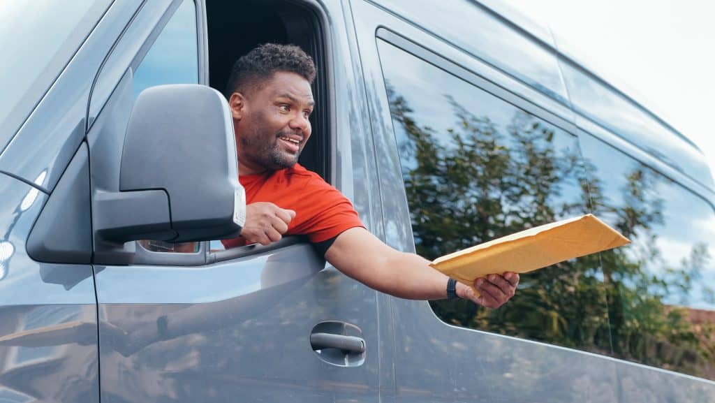 A man riding a van