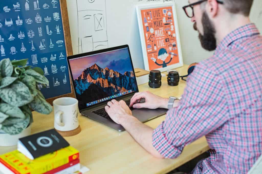 man working on laptop