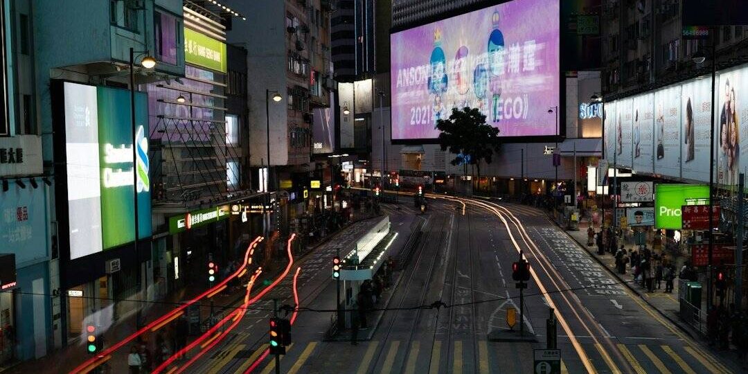 cars on road in between buildings during night time future of advertising, artificial intelligence, marketing technology