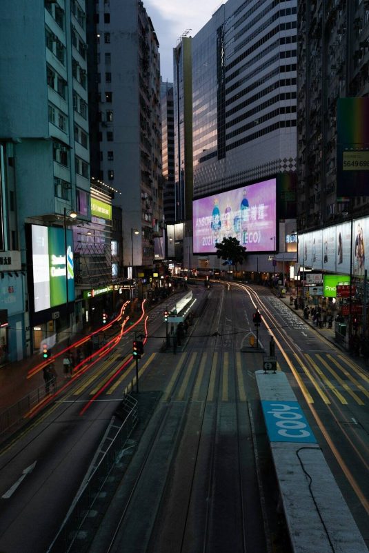 cars on road in between buildings during night time future of advertising, artificial intelligence, marketing technology