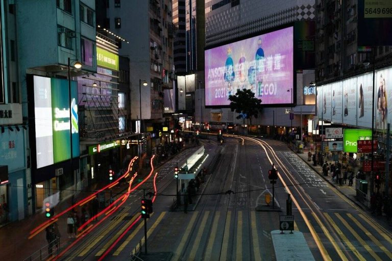 cars on road in between buildings during night time future of advertising, artificial intelligence, marketing technology