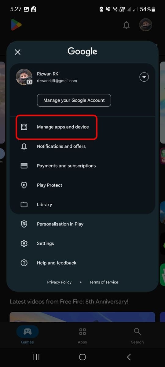 A menu will appear. From this menu, tap on the option that says “Manage apps & device.”