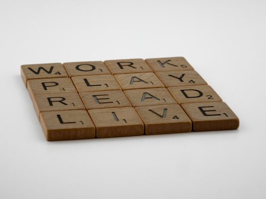 a scrabble tile with words that spell out work, play, and live ai education, personalized learning, wordpress dashboard