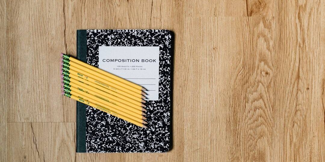 white and black card on brown wooden table ai education, personalized learning, wordpress dashboard