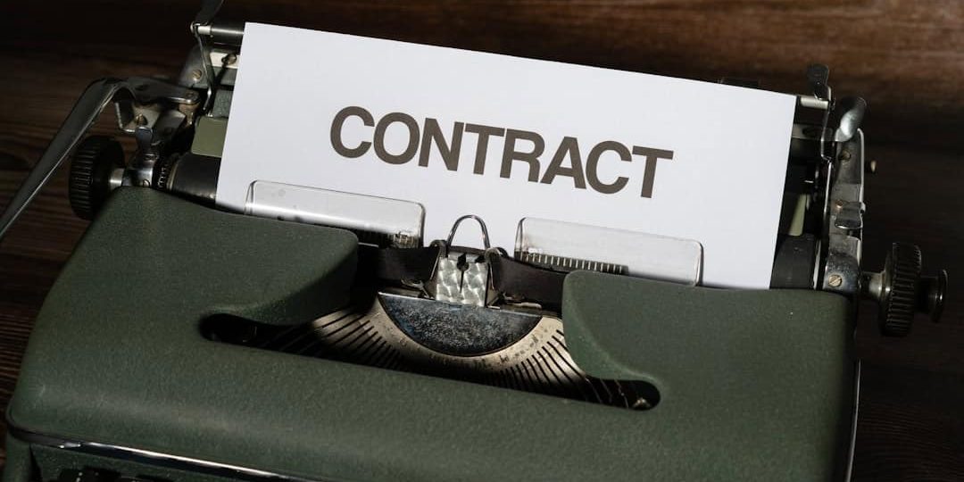 a close up of a typewriter with a sign that reads contact contract approval, legal technology, corporate documents