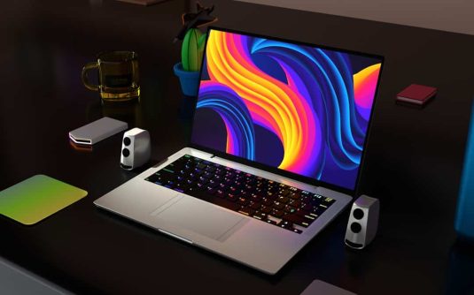 a laptop computer sitting on top of a desk gaming laptop screen, qhd display, color accuracy, creative work