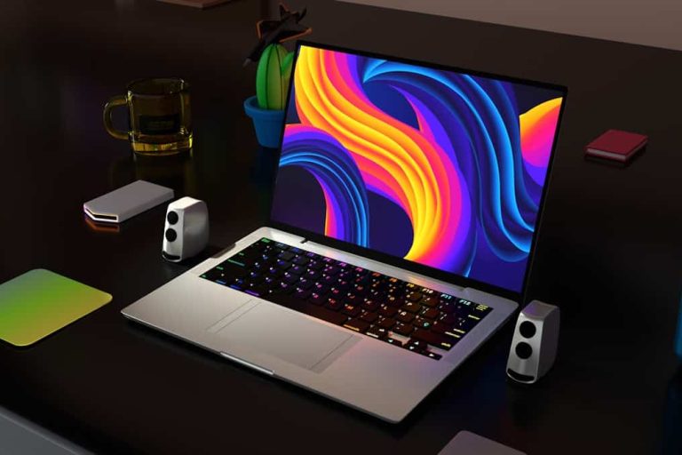 a laptop computer sitting on top of a desk gaming laptop screen, qhd display, color accuracy, creative work