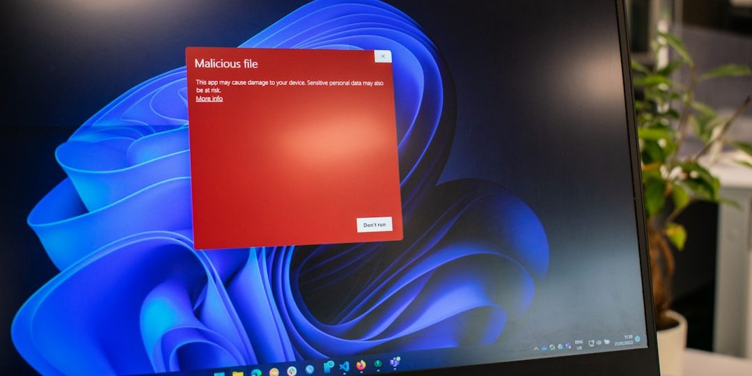 a dell laptop computer with a red screen Windows update error screen, laptop issue, system update failure