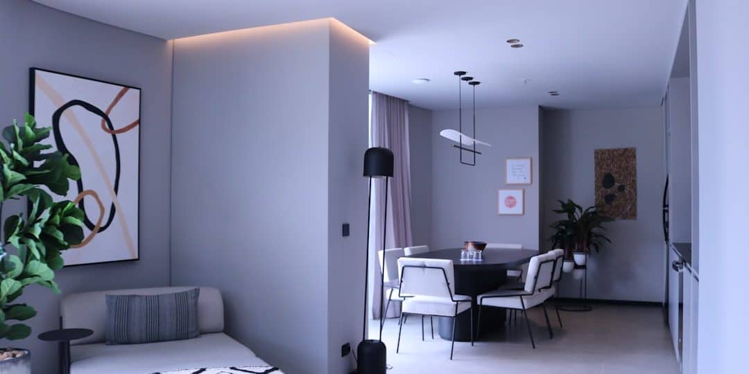 a living room filled with furniture and a painting on the wall ai interior design, room transformation, digital makeover