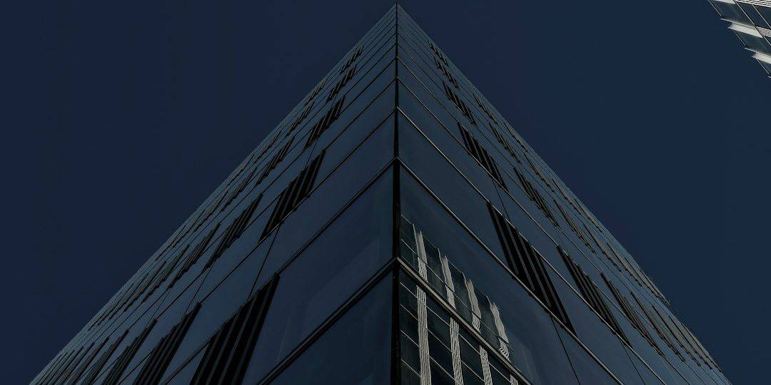 a very tall building with a sky background upload interface chatgpt input image screenshot