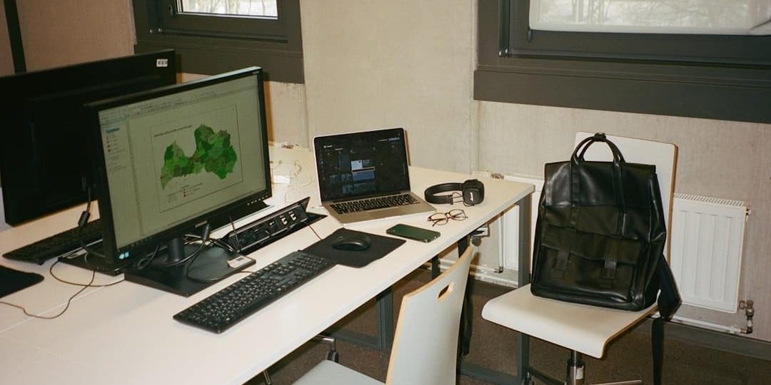 a white desk with a laptop and a computer on it vpn setup, students, mobile devices, laptops