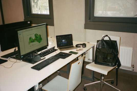 a white desk with a laptop and a computer on it vpn setup, students, mobile devices, laptops