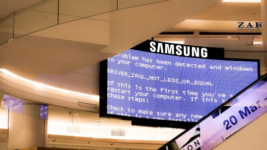 black Samsung flat screen monitor turned-on displaying boot sequence error adb error message computer screen code