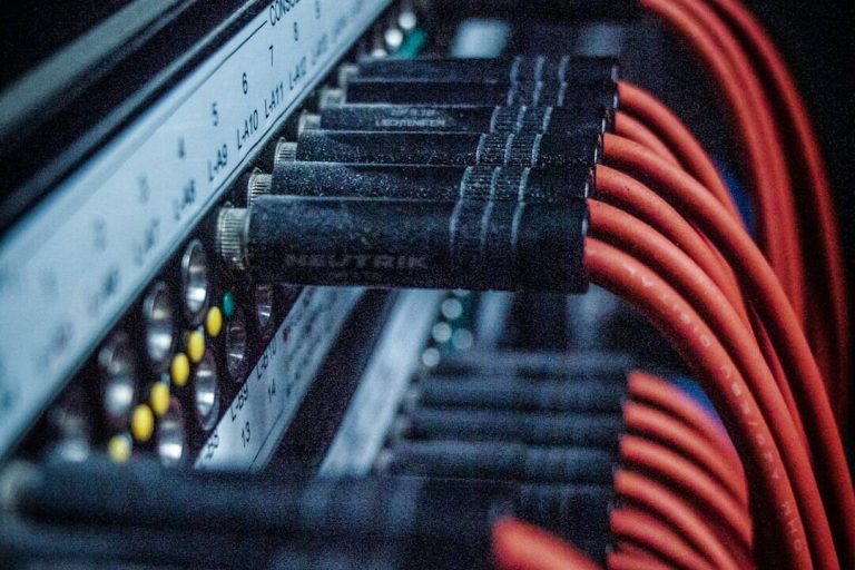 selective focus photography of audio jacks system integration, cyber infrastructure, data flow