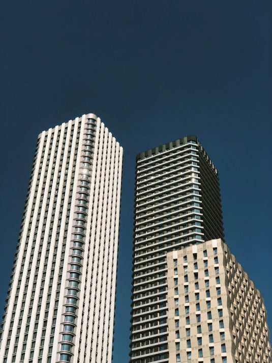 a couple of tall buildings office building, city skyline, real estate location map
