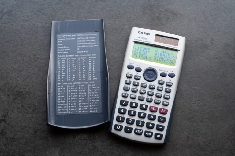 A scientific calculator with its cover open calculator tool website customer user feedback