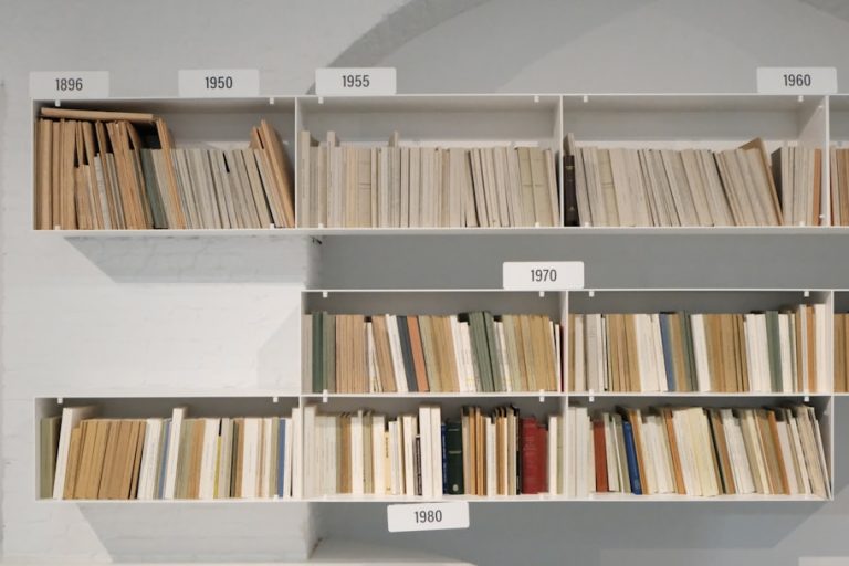 books on white wooden shelf digital directory, data organization, web resources
