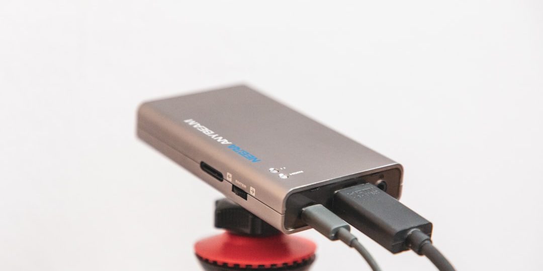 black and gray power bank smartphone charging, qi2 compatibility, magnet alignment