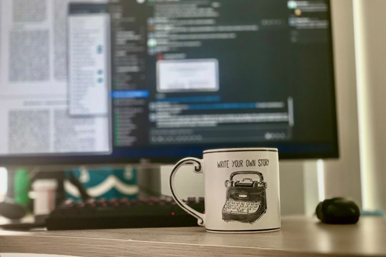 white and black ceramic mug beside black computer mouse joomla plugin, code editor, coffee mug, early morning