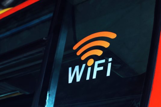 a close up of the wifi logo on the side of a bus wifi troubleshooting smartphone router