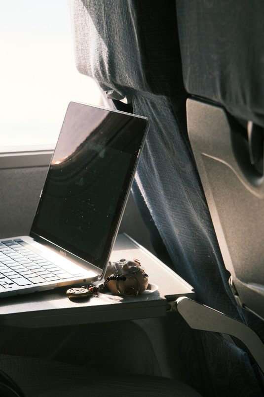 a laptop computer sitting on top of a desk student ipad digital nomad productivity travel