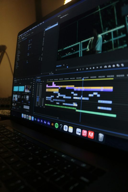 Video editing software interface on a laptop screen. happy video editor, smooth timeline, editing software success