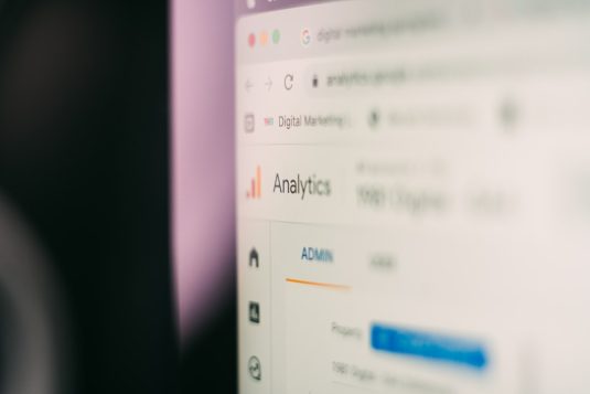 a close up of a computer screen with a blurry background ai email marketing analytics dashboard