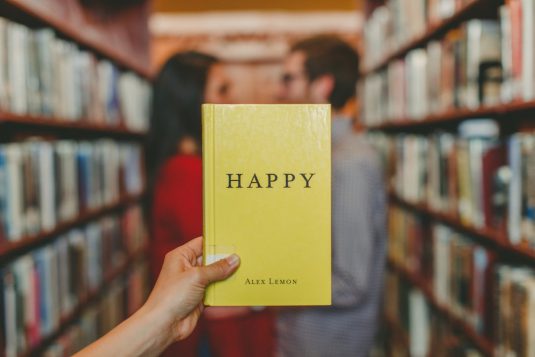 person holding Happy by Alex Lemon book book review, happy reader, entrepreneur lifestyle
